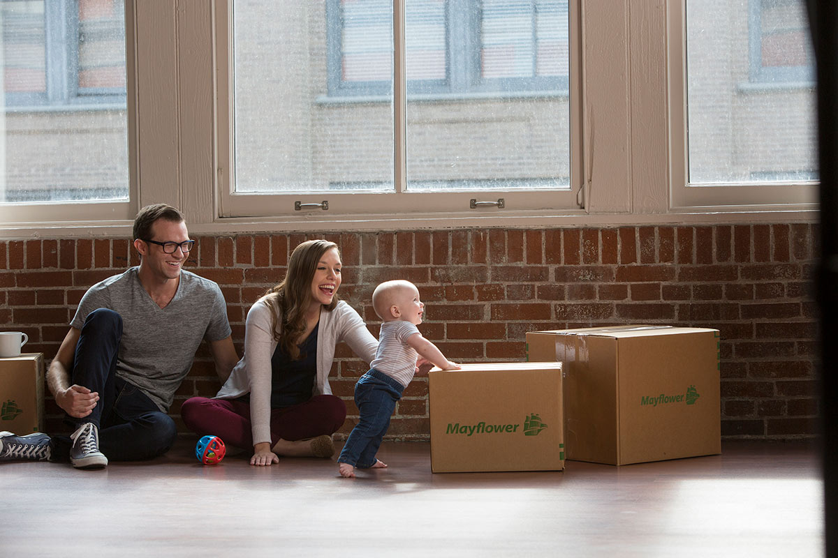 couple moving with baby